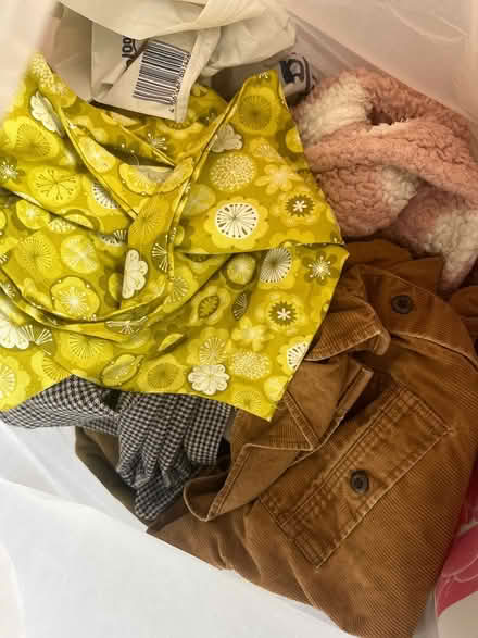 Photo of free Bag of women’s clothes & books (Stretford) #1