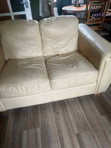 Photo of free Cream leather 2 seater sofa (Potter Heigham NR29) #1