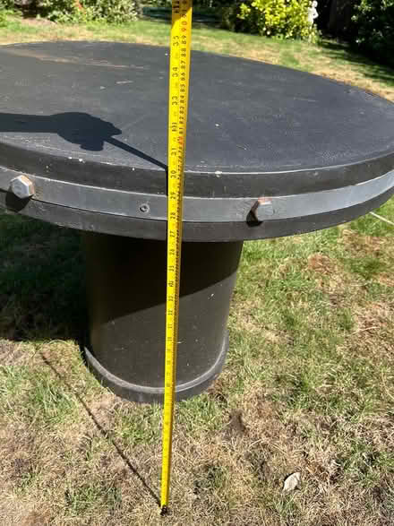 Photo of free Round solid black table (Barnes SW13) #3