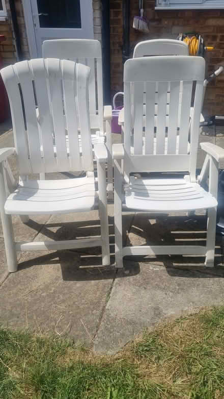 Photo of free White plastic garden chair x4 (Langley SL3) #1
