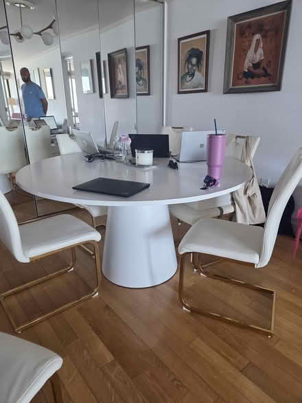 Photo of free 60 in round white wood dininf table (Yonkers) #1