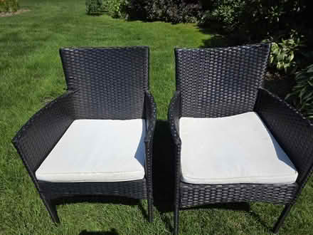 Photo of free Rattan black chairs with cushions (M-36 and Hooker, Pinckney) #1