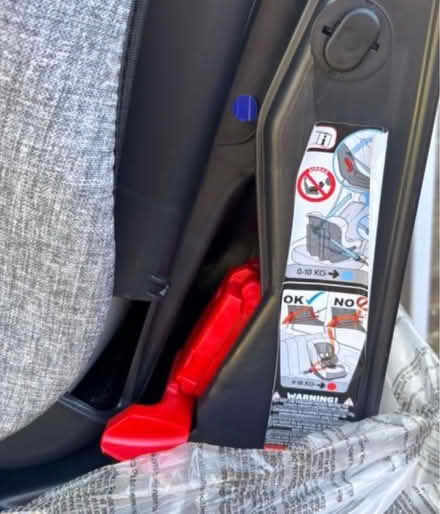 Photo of Nania car seat red belt tensioner (Telford) #1