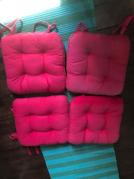 Photo of free Four red seat cushions - some fading (Sprowston NR7) #1