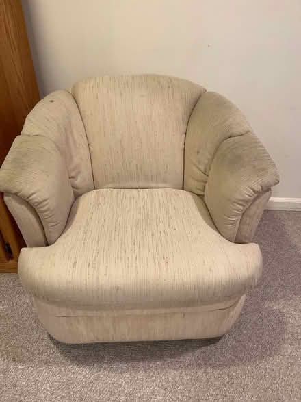 Photo of free Beige swivel chair (Teaneck, NJ) #1
