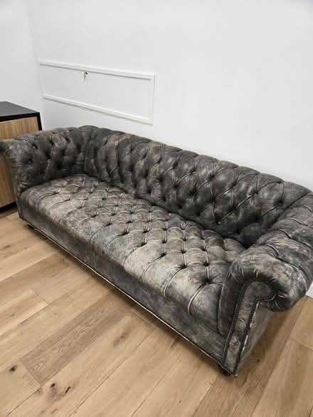 Photo of free Faux distressed leather couch (Financial District.) #2