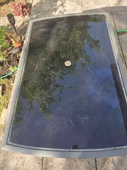 Photo of free Glass black and grey outside table (Edgware HA8) #1