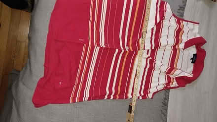 Photo of free Woman's polo top (near Britannia Plaza) #1