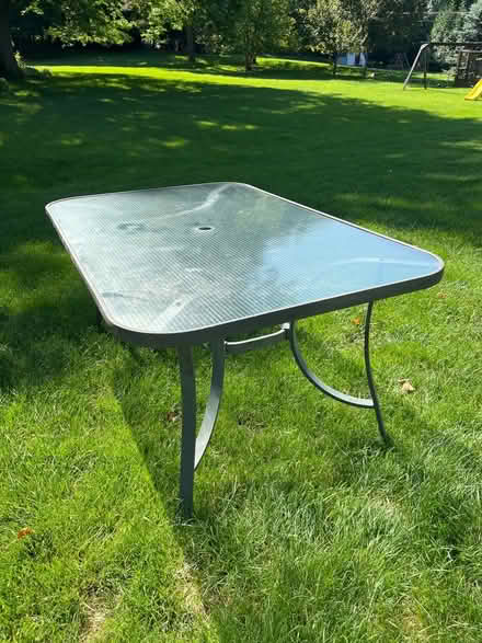 Photo of free Glass Top Patio Table (Farmington Hills) #1