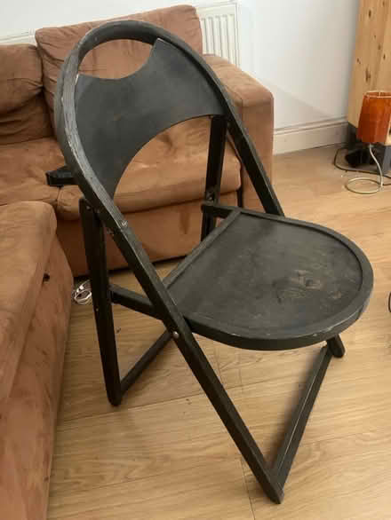 Photo of free Black folding wooden chairs x4 (E10) #1
