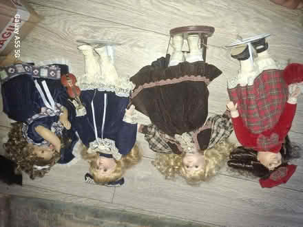 Photo of free 4 porcelain dolls 3 with stands and 1 lying down (Westgate LA4) #1
