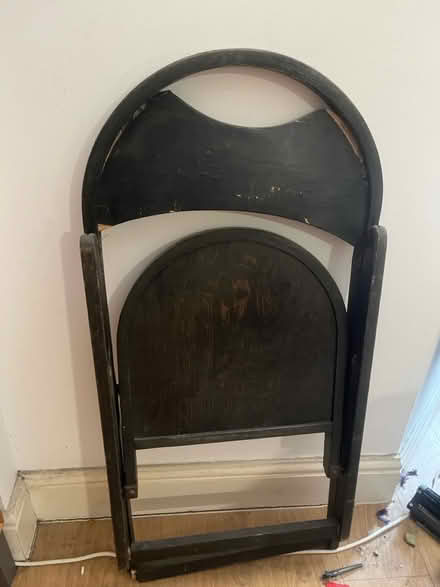 Photo of free Black folding wooden chairs x4 (E10) #2