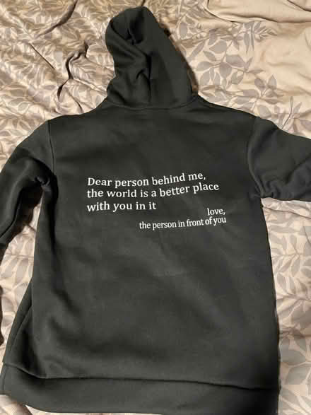 Photo of free Black hoodie w/ message (12th & Otis Streets NE) #2