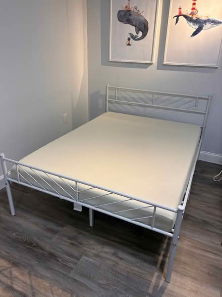 Photo of free Full size mattress with bed frame (West Side) #1