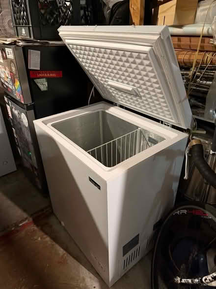 Photo of free Fridge or freezer (69th Ave btw 60th Ln & 60th st) #1