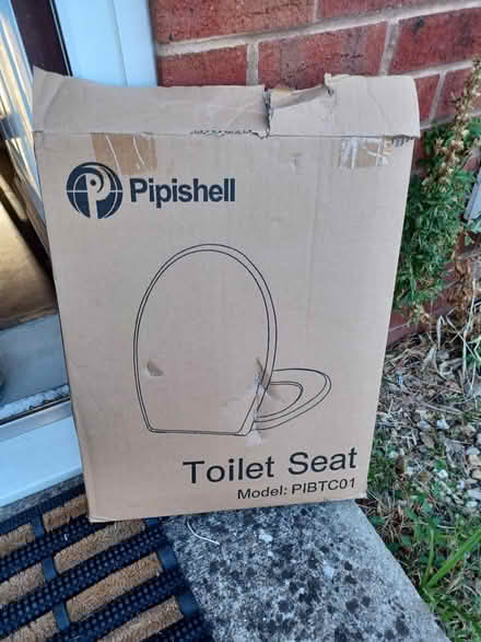 Photo of free Pipistrelle white toilet seat (Brockworth) #1
