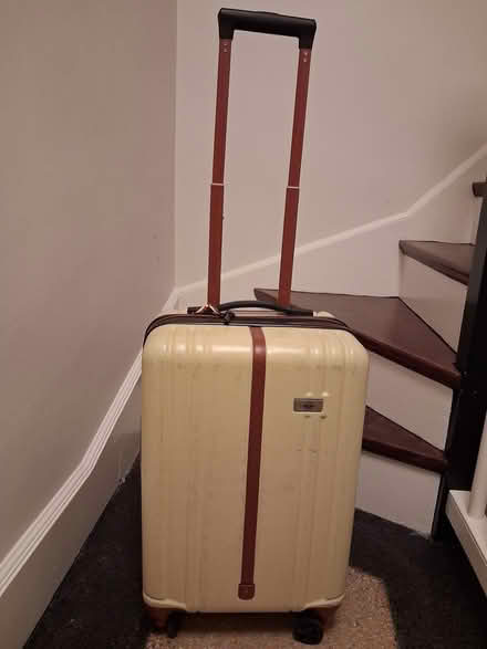 Photo of free Suitcase w-cracked wheel base (Beacon Hill) #1