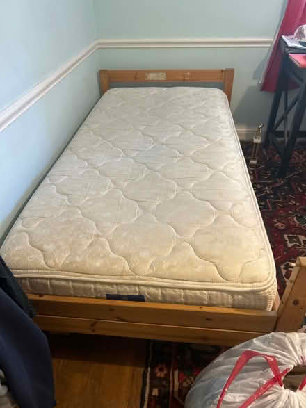 Photo of free Twin beds in wooden frames (West akron near ken Stewart’s) #1