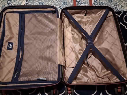Photo of free Suitcase w-cracked wheel base (Beacon Hill) #2