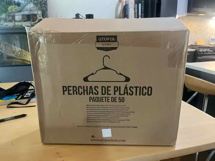 Photo of free white plastic coat hangers (Oakland) #1
