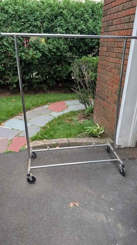 Photo of free Rolling coat rack (Teaneck, NJ) #1