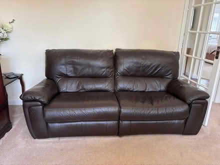 Photo of free Three seater brown leather sofa with motorised recliner x 2 (Sidley TN39) #2