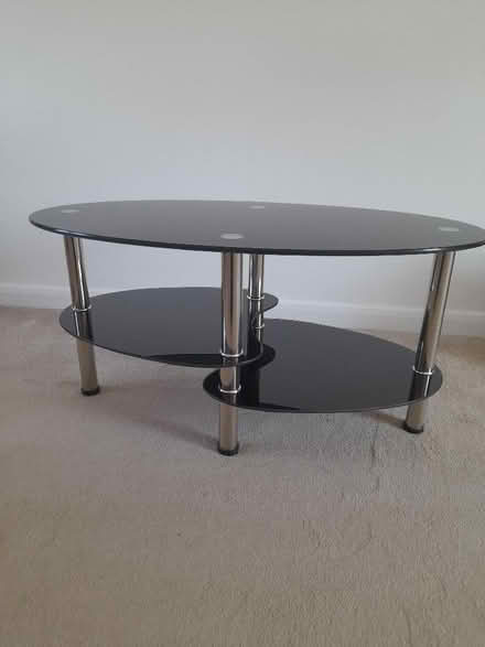 Photo of free Oval black glass coffee table (Sapcote LE9) #1