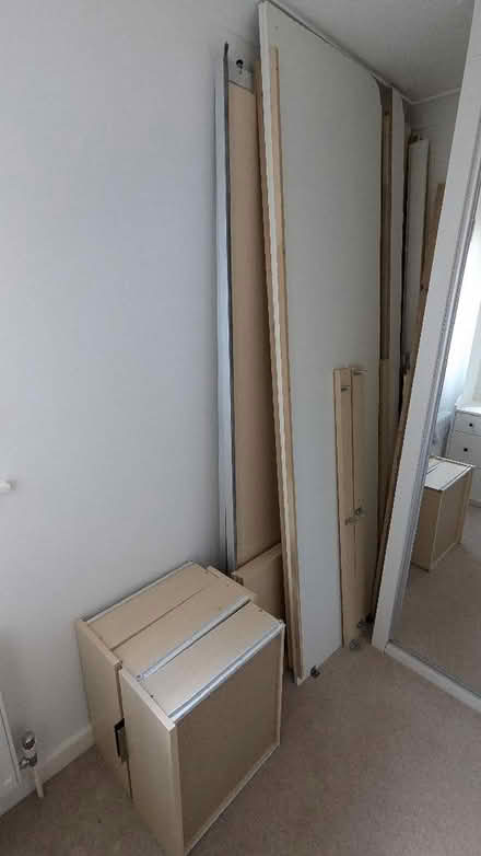 Photo of free Built in cupboard with sliding mirrored doors. (East Lavant PO19) #3