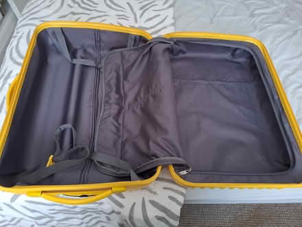 Photo of free Medium yellow suit case 4 wheels (CT14) #2