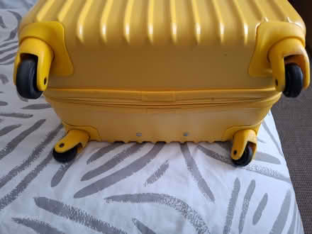 Photo of free Medium yellow suit case 4 wheels (CT14) #3