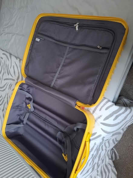 Photo of free Medium yellow suit case 4 wheels (CT14) #4