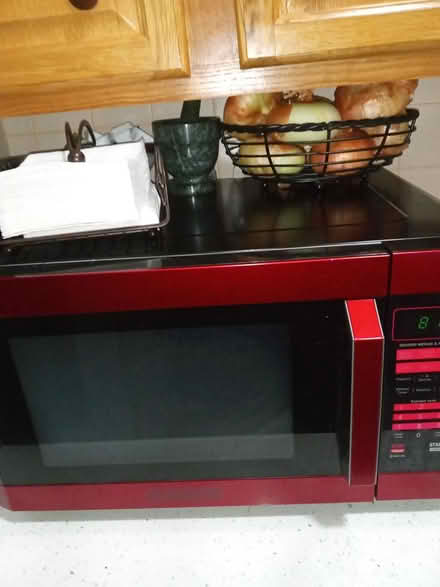 Photo of free Red/Black Microwave (Harlem West 131st. Street) #2
