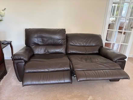 Photo of free Three seater brown leather sofa with motorised recliner x 2 (Sidley TN39) #1