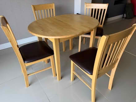 Photo of free Wooden Table and four chairs (Innsworth GL3) #1