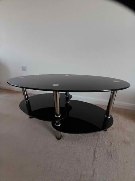 Photo of free Oval black glass coffee table (Sapcote LE9) #2