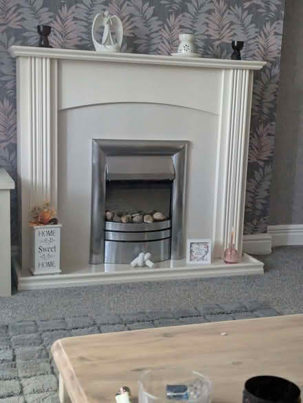 Photo of free Fire surround with electric fire (Manor Top S2) #1
