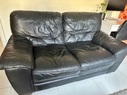Photo of free Black leather sofa (Adamstown dublin) #1