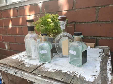 Photo of free Small glass bottles with stoppers (Ffairfach SA19) #1