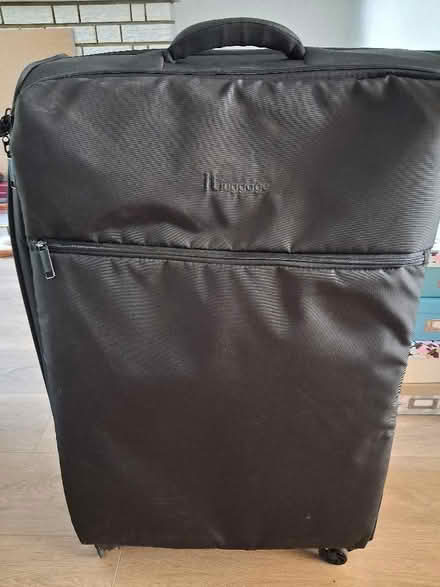Photo of free big suitcase (Goldington MK41) #2