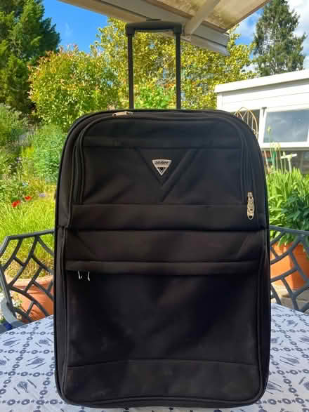 Photo of free Large travel suitcase with 4 wheels and pull out handle (Sanderstead CR2) #1