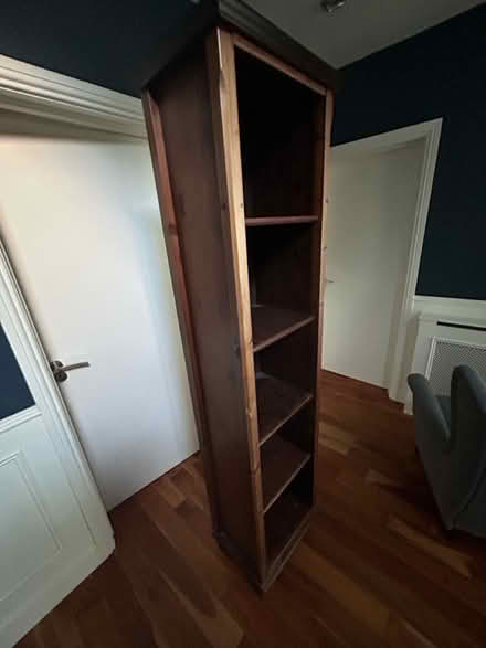 Photo of free Tall wood shelving unit (Booterstown, Co. Dublin) #1