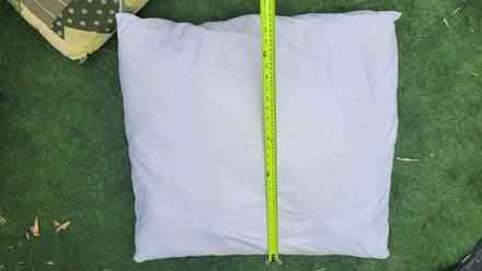 Photo of free Large (50cm squared) white cuddly cushion (Northcote Road SW11) #1