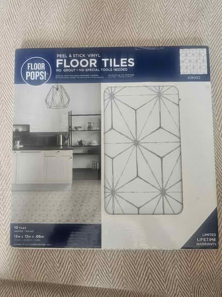 Photo of free Pack of peel and stick floor tiles (Clapham Common SW4) #1