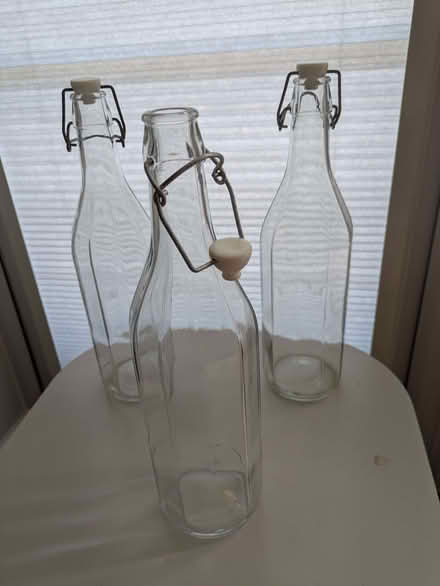 Photo of free 3 1ltr glass drinks bottles (South Malling BN7) #1