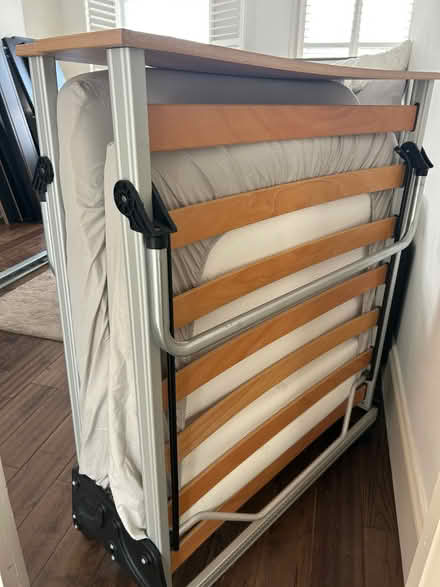 Photo of free Single foldable bed (West Kensington W14) #1