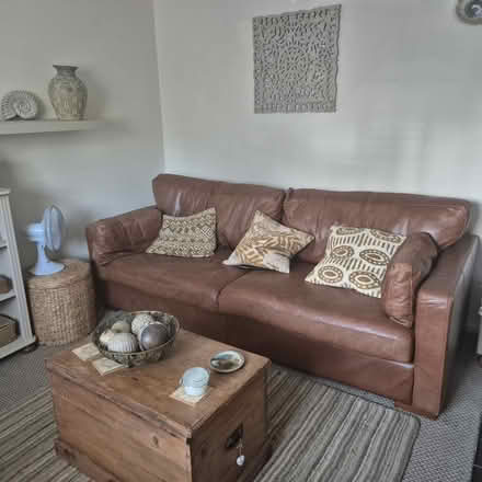 Photo of free Large 3 seat tan leather sofa (Much wenlock TF13) #1