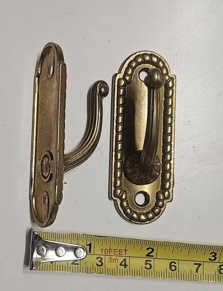 Photo of free Brass curtain stay hooks (Southwater RH13) #1