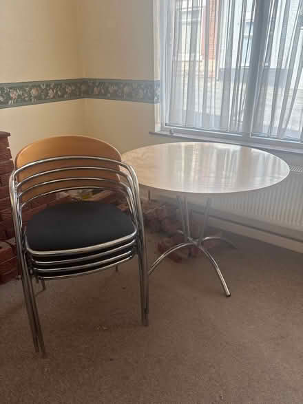 Photo of free Good heavy table with four chairs (Sherland Street, Chesterfield) #1
