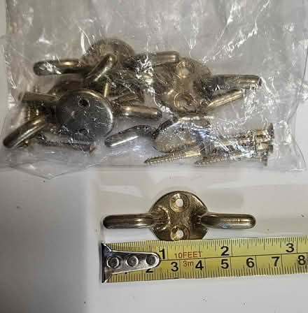 Photo of free 6 brass cord ties (Southwater RH13) #1