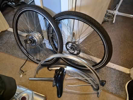 Photo of free 2 Large Wheels, Mudguards & Seat From an Electric Bike (Old Farm Park MK7) #1